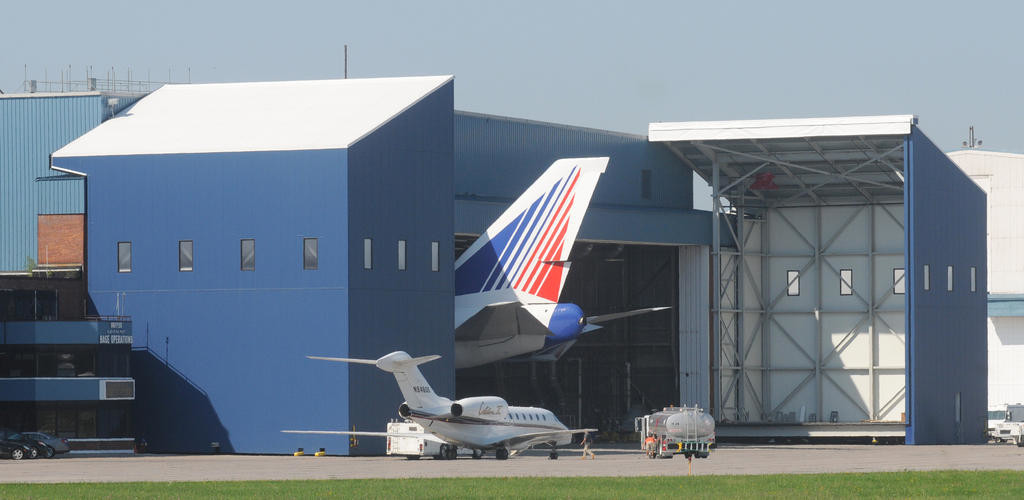 MidAir hangar with 747 tail sticking out from this past summer   (Sentinel photo by John Clifford)