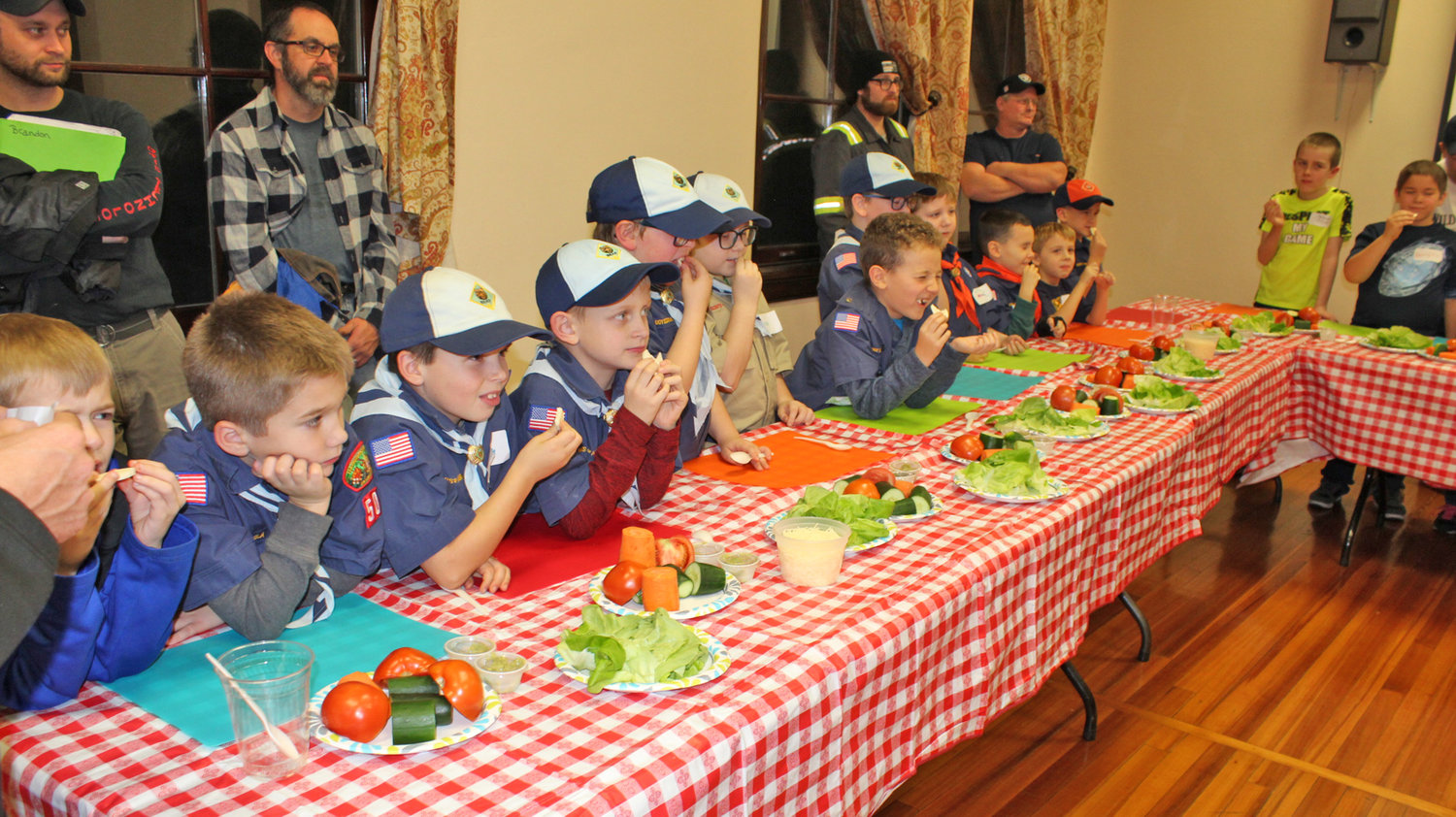 NOW THAT’S GOOD — Members of Boy Scouts Pack 50 of Rome taste star fruit and a variety of vegetables during a demonstration conducted by Bon Appetit of Hamilton College.