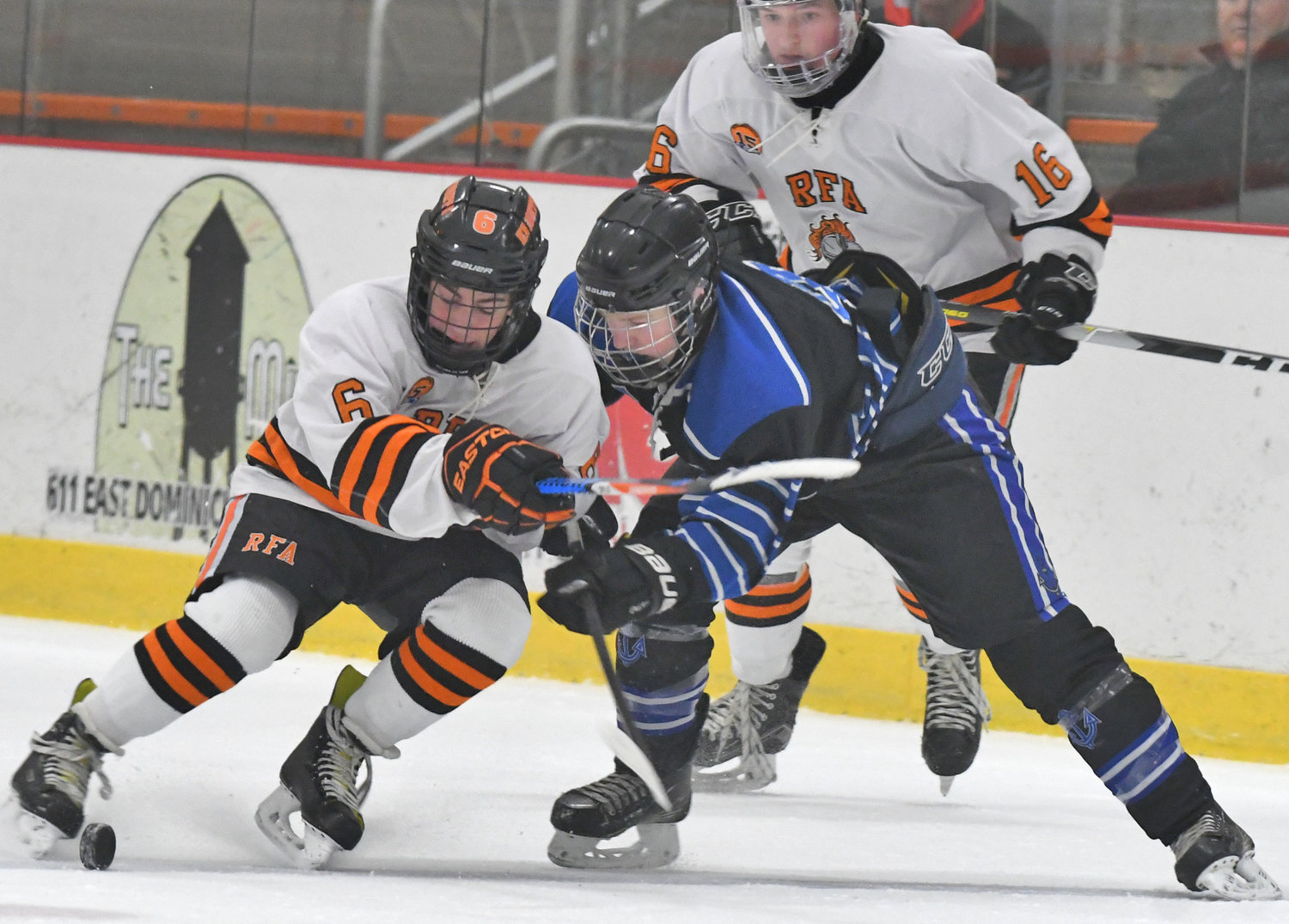 RFA #6 and Geneseo #9try to control the puck
