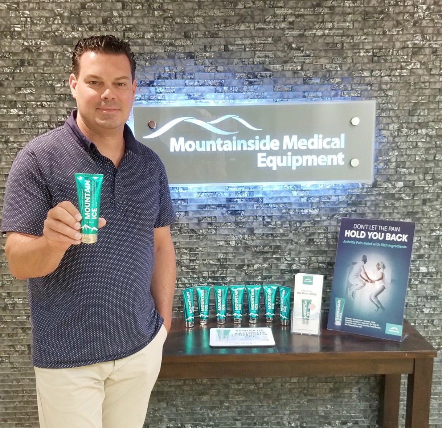 MOUNTAIN ICE — Clinton resident and medical product distributor Martin Zarnock Jr. is pictured with his arthritis pain relieving gel, Mountain Ice.