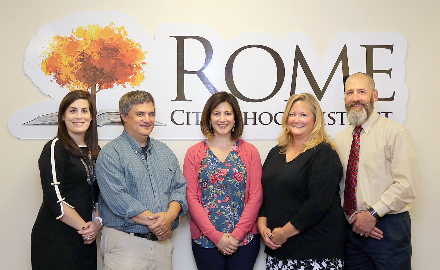 GRANTS AWARDED — Among Rome school district teachers who have been awarded funding from a Rome Air Force Research Laboratory grant initiative for STEM (science, technology, engineering, math), starting second from left: Albert Bangs, Megan Spado and Christina Steurrys. At far left is school district Director of Fine Arts and Engineering Technology Andrea Falvo, and at far right is Jeff DeMatteis, Rome Lab STEM outreach coordinator.