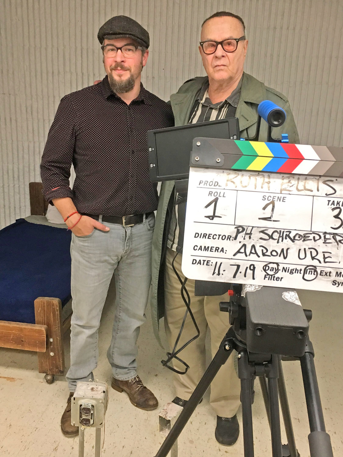 COLLABORATORS — Aaron Ure, videographer, and producer/director Peter-Henry Schroeder pose for a photo inside a room at Oneida Municipal Center they are using to shoot the feature film, “Ruth Ellis.”