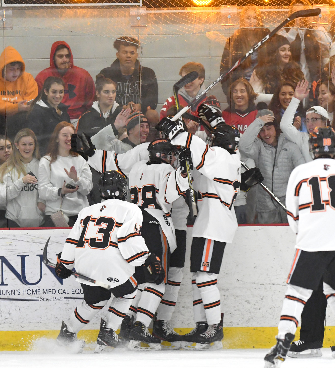 FIRST OF FIVE — Rome Free Academy hockey players celebrate the first goal of the game in their 5-2 win over Ithaca on Friday night at Kennedy Arena. Joey Gulla got the tally on an assist from Jake Hall.