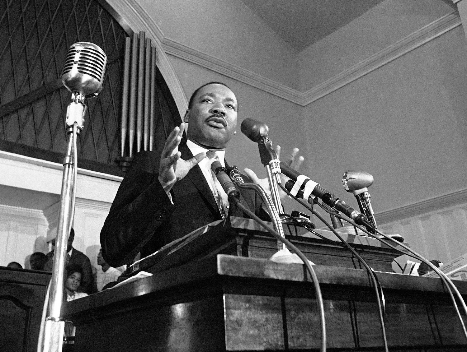 FILE - In this 1960 file photo, Martin Luther King Jr. speaks in Atlanta. The civil rights leader had carried the banner for the causes of social justice ‚Äî organizing protests, leading marches and making powerful speeches exposing the scourges of segregation, poverty and racism. Following the publication of "An Appeal for Human Rights" on March 9, 1960, students at Atlanta's historically black colleges waged a nonviolent campaign of boycotts and sit-ins protesting segregation at restaurants, theaters, parks and government buildings. (AP Photo, File)
