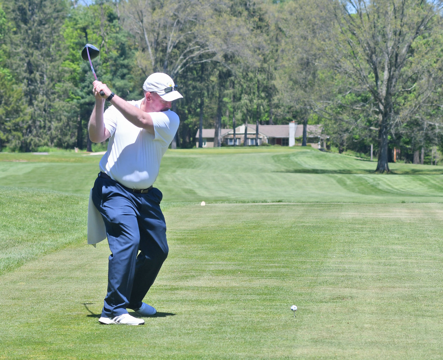 SENDING THE DRIVE — Teugega Country Club president Doug Bartell rips his drive on the second hole Wednesday afternoon.