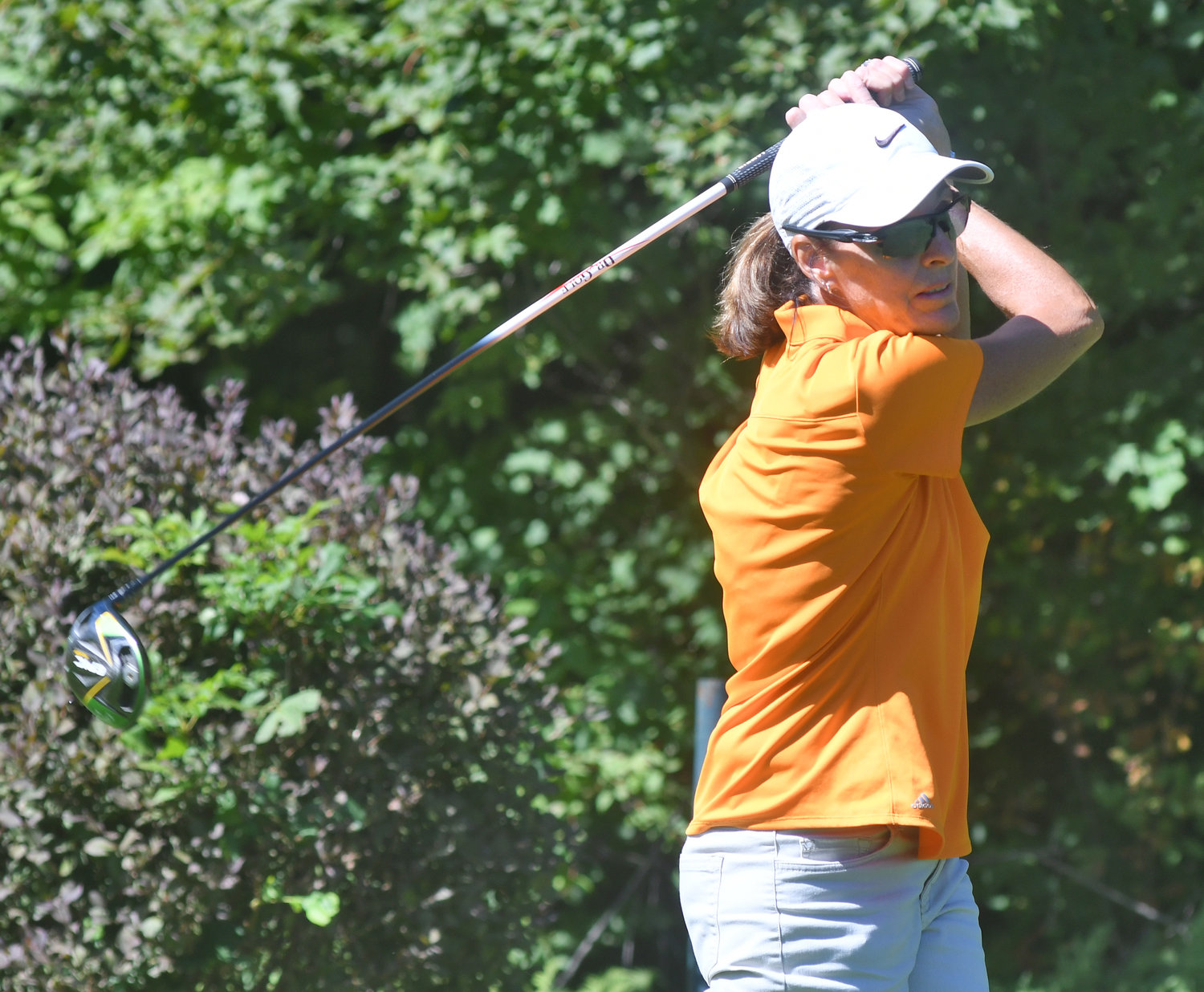 TEEING OFF — Teresa Cleland tees off on the ninth hole at Rome Country Club on Monday morning during the Rome City Women’s Amateur Golf Tournament. Cleland shot a 77 for the tournament.