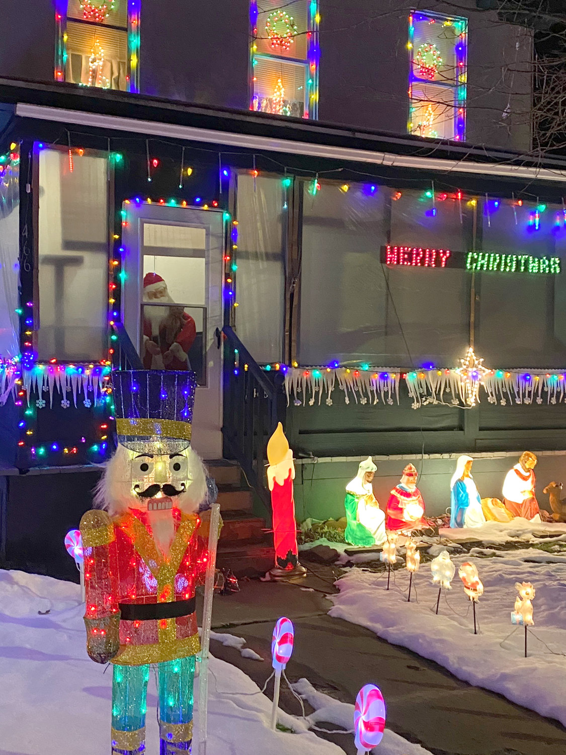 FIRST PLACE — Oneida’s first Light Fight saw the Butler family, 466 E. Walnut St., take home first prize and a slew of gift cards from local businesses. The home featured an array of lights and ornaments and numerous  iconic characters.
