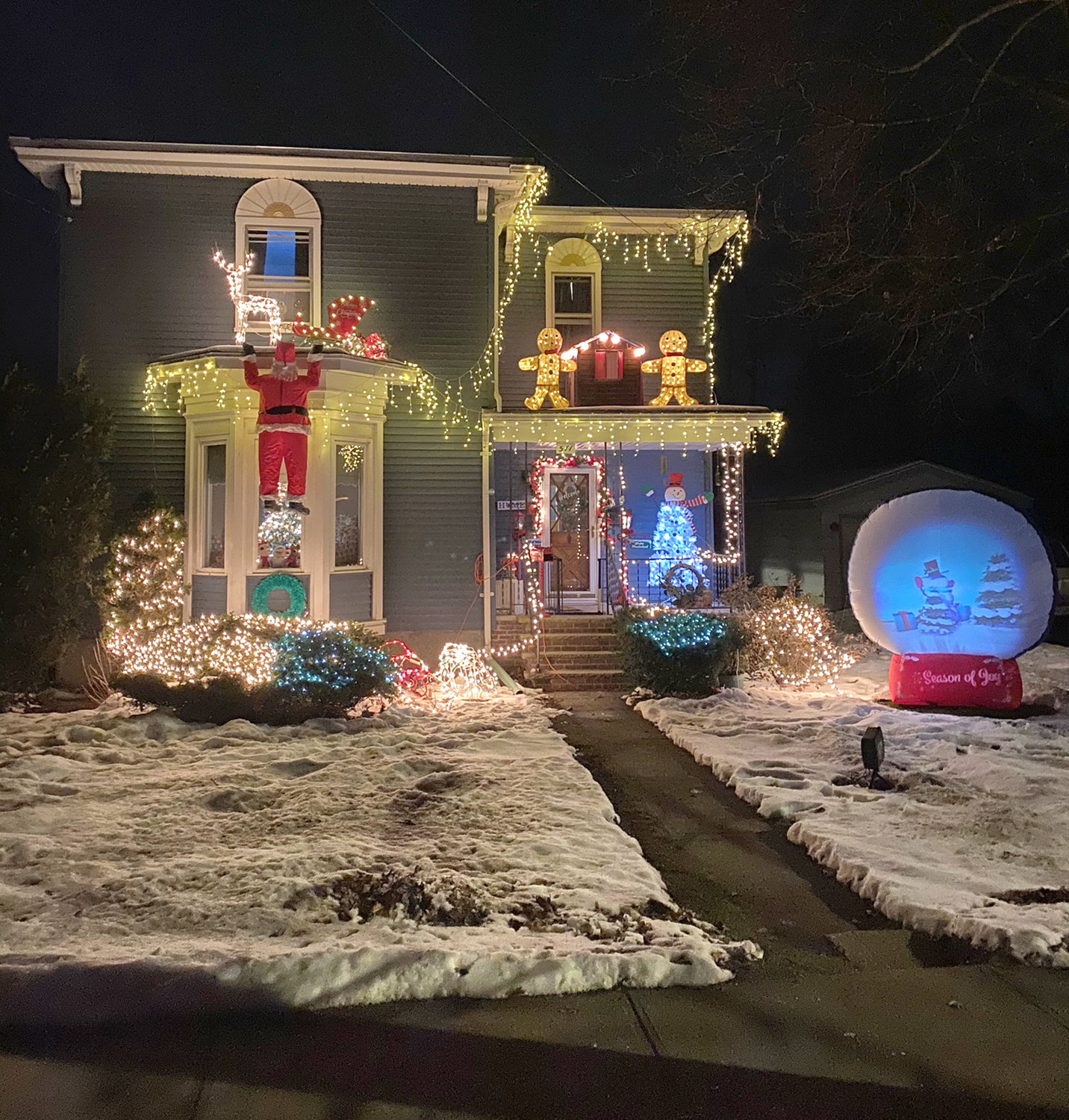 THIRD PLACE — Oneida’s first Light Fight saw Jennifer Kimball and her family, of 511 Seneca St., take home third prize and numerous gift cards from local businesses. The home featured festive lights, decorations, and Santa Claus in a sticky situation.