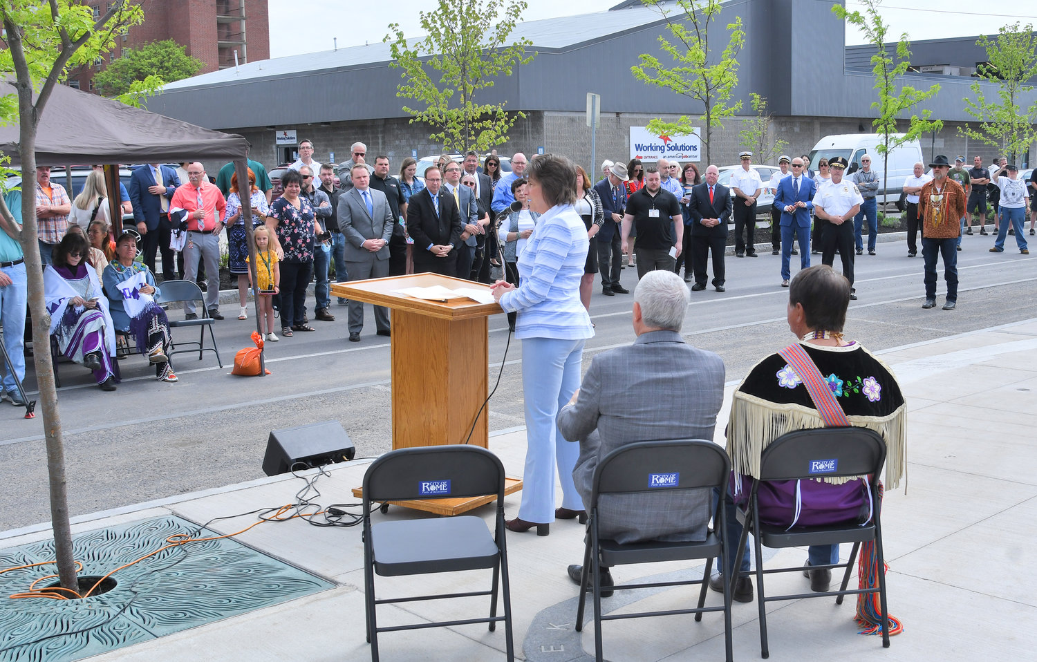 UNVEILING CEREMONY — Rome Mayor Jacqueline M. Izzo addresses the crowd gathered for the official unveiling ceremony of the new Oneida Nation monument located outside 301 W. Dominick St. Tuesday morning.