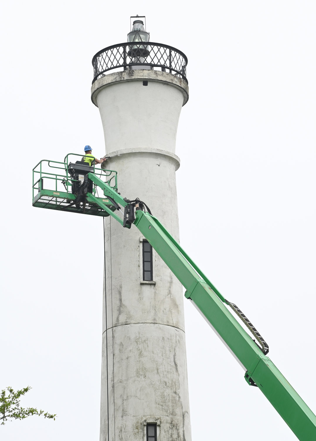 LIGHTHOUSE CLEANING — New York Power Authority crews pressure wash the Verona Beach Lighthouse Wednesday afternoon as they prepare for the installation of LED lights as part of the Iconic Lighting Project.