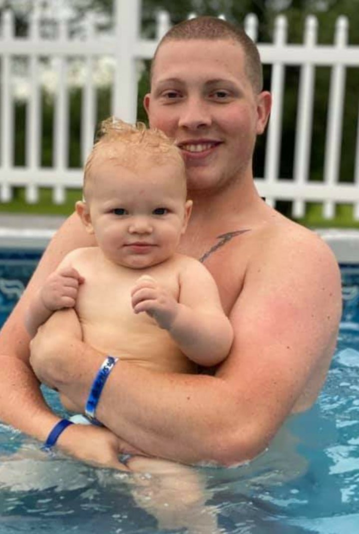 MAKING CHANGES — Tyler McBain holds his son Maverick. After going through rehab at Tully Hill, McBain was making changes in his life and had plans to become an addiction counselor. He was 22-years-old when he was killed.