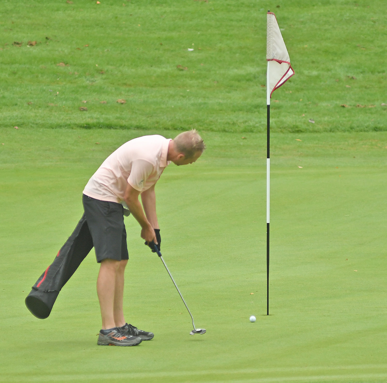 TAP IT IN — Rome's Wes Cupp putts for birdie on the par 5 7th hole, but it lipped out and he made the tap-in par during the second round of the Thirsty Owl New York Speedgolf Open at Rome Country Club on Monday morning.