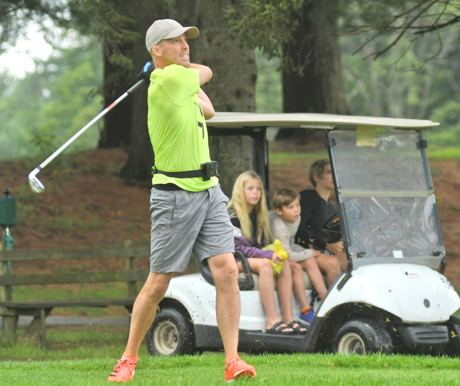 OFF THE TEE — Luther Olsen from Holmes, Wis., watches his tee shot on three fly with his family watching in the golf cart during the second round of the Thirsty Owl New York Speedgolf Open at Rome Country Club.