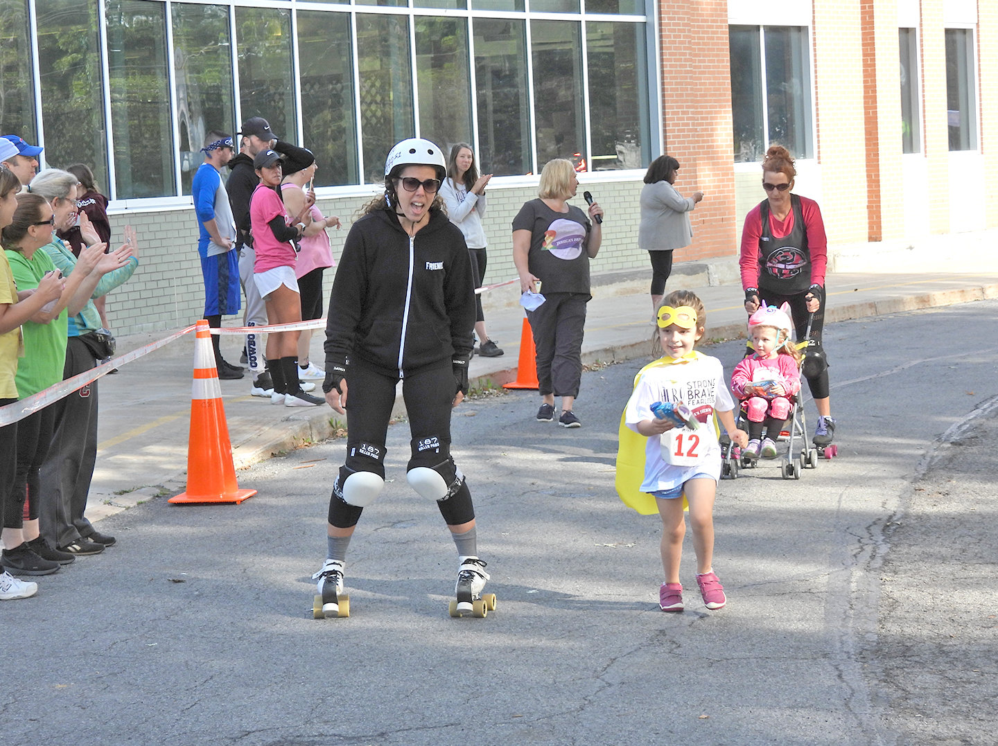 COMING IN FOR THE FINISH — Local children make it to the finish line for Jessica’s Heroes 5K Walk and Run. Jessica’s Heroes raised $62,000, which goes to people in the local area fighting cancer to help pay for bills. Anyone and everyone can benefit from Jessica’s Heroes.
