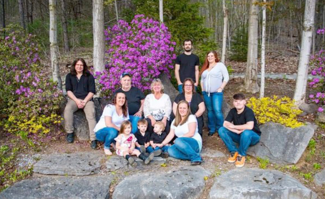 FAMILY GATHERING — Breast cancer survivor Dawn Pfendler pictured with her family at a recent gathering. In front: her daughter Samantha DeVoe Hoffert, granddaughter Jayla Hoffert, grandsons Logan and Colt Fox, daughter Jackie DeVoe Fox, and grandson, Deakin Hoffert (right). Second row, parents Russell and Janice Pfendler, and Dawn. In back are Dawn’s brother Craig Pfendler (left), son Nick Pfendler and daughter Brett Ellen Pfendler. Missing from photo are new granddaughter Lenox Nevaeh Pounds and Dawn’s brother Russell Pfendler Jr. of North Carolina.