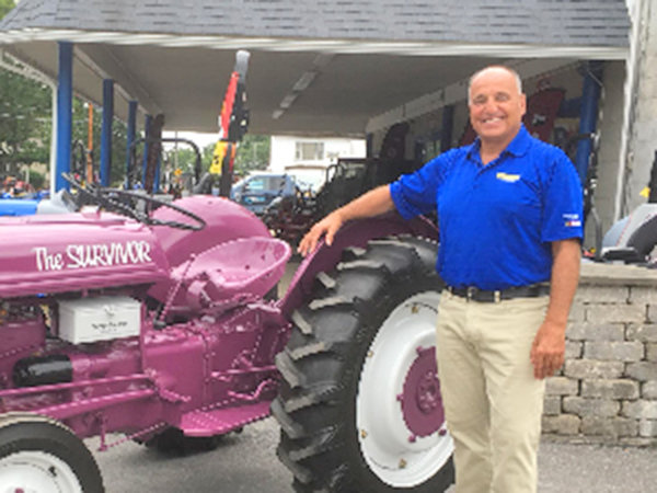 PINK TRACTOR — Inspired by seeing a Breast Cancer “Survivor“ tractor at a New Holland dealer meeting several years ago, Clinton Tractor co-owner John Calidonna had a 1940 Ford 9N model that was found on the side of the road restored into their own Survivor tractor. The purple tractor has been in numerous parades and Relay for Life events.