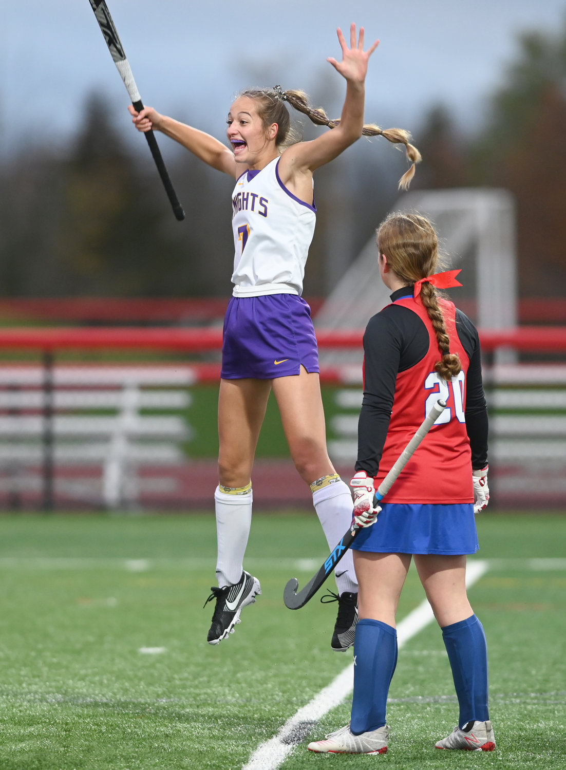 CHAMPIONSHIP GOAL — Holland Patent’s Alivia Alexander jumps high in the air after scoring her first goal of the Section III Class B title game against New Hartford Sunday at Vernon-Verona-Sherrill High School. It was her first of two goals in the Golden Knights’ 6-0 win. New Hartford’s Sienna Holmes looks on.