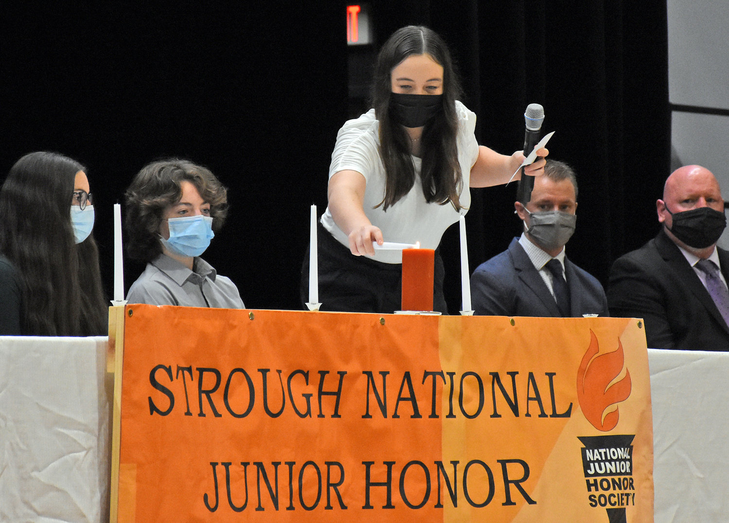 CEREMONY — Students participate in the National Junior Honor Society induction ceremony at Strough Middle School.