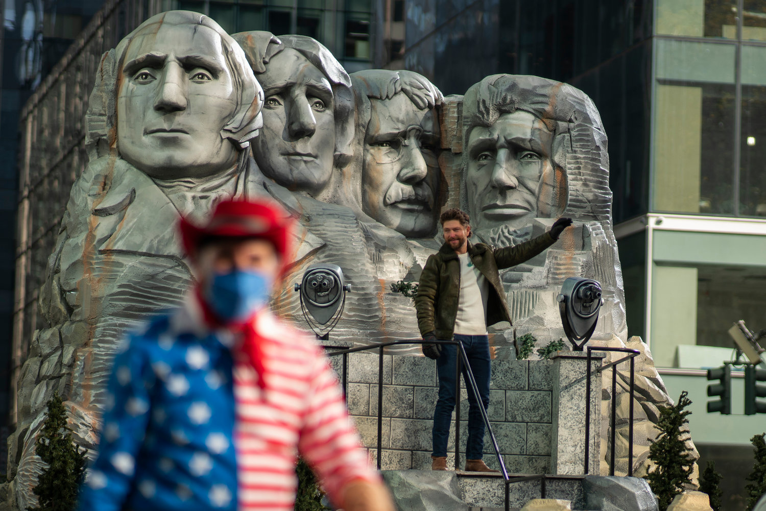 LANDMARK FLOAT — Chris Lane rides on a Mount Rushmore themed float during the Macy’s Thanksgiving Day Parade Thursday in New York.