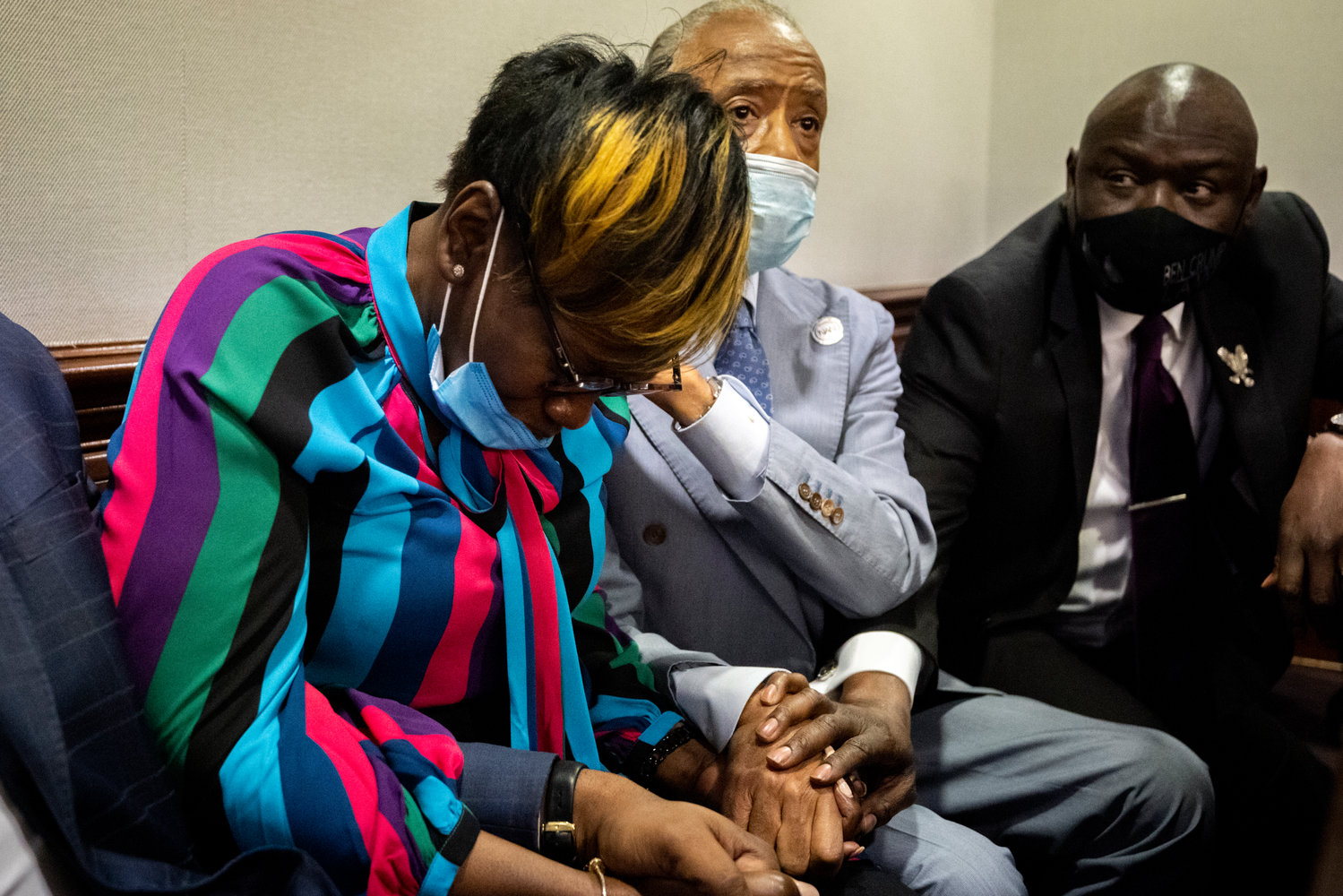 MOTHER GRIEVES — Ahmaud Arbery’s mother, Wanda Cooper-Jones, left, is comforted by Rev. Al Sharpton after the jury convicted Travis McMichael in the Glynn County Courthouse Wednesday in Brunswick, Ga.