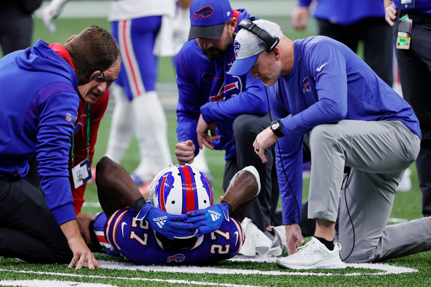 OUT FOR THE SEASON — Injured Buffalo Bills cornerback Tre’Davious White (27) is helped by head coach Sean McDermott, right, and medical staff in the first half of an NFL game against the New Orleans Saints in New Orleans, Thursday, Nov. 25. The Bills confirmed that White tore his ACL and will be out for the remainder of the season.