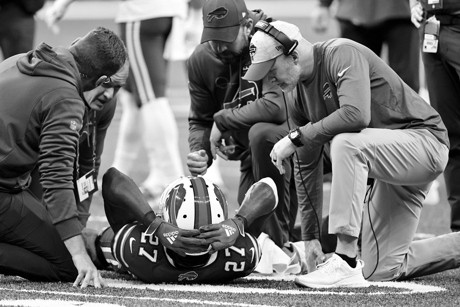 OUT FOR THE SEASON — Injured Buffalo Bills cornerback Tre’Davious White (27) is helped by head coach Sean McDermott, right, and medical staff in the first half of an NFL game against the New Orleans Saints in New Orleans, Thursday, Nov. 25. The Bills confirmed that White tore his ACL and will be out for the remainder of the season.