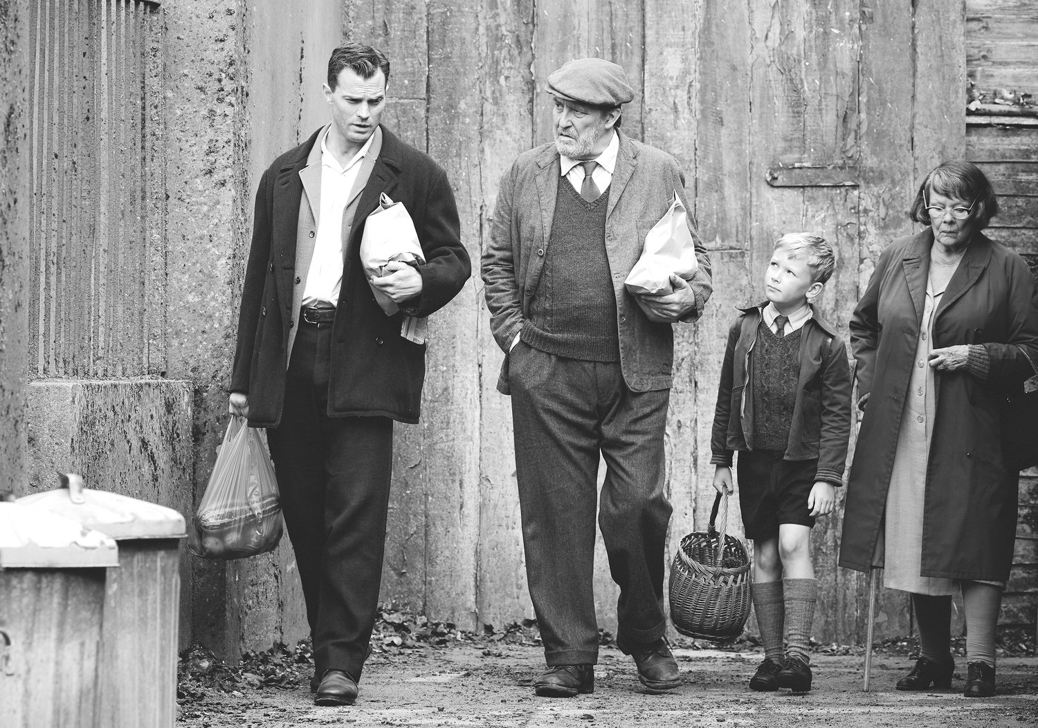 Poignant — From left, Jamie Dornan as “Pa”, Ciarán Hinds as “Pop”, Jude Hill as “Buddy”, and Judi Dench as “Granny” in a scene from “Belfast.”