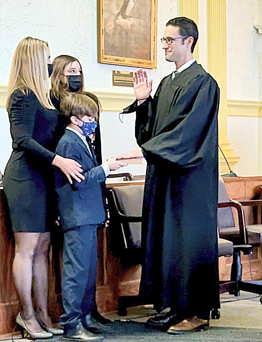 SWORN IN — Jason Flemma was sworn in as the newest Oneida County Family Court Judge on Wednesday in the Ceremonial Courtroom at the Oneida County Courthouse in Utica. Oneida County Family Court Judge Julia M. Brouillette, officiated. Due to COVID-19 restrictions, the swearing in attendance was limited. Present, and pictured were Flemma’s wife Alana, daughter Isadora and son Sebastian.