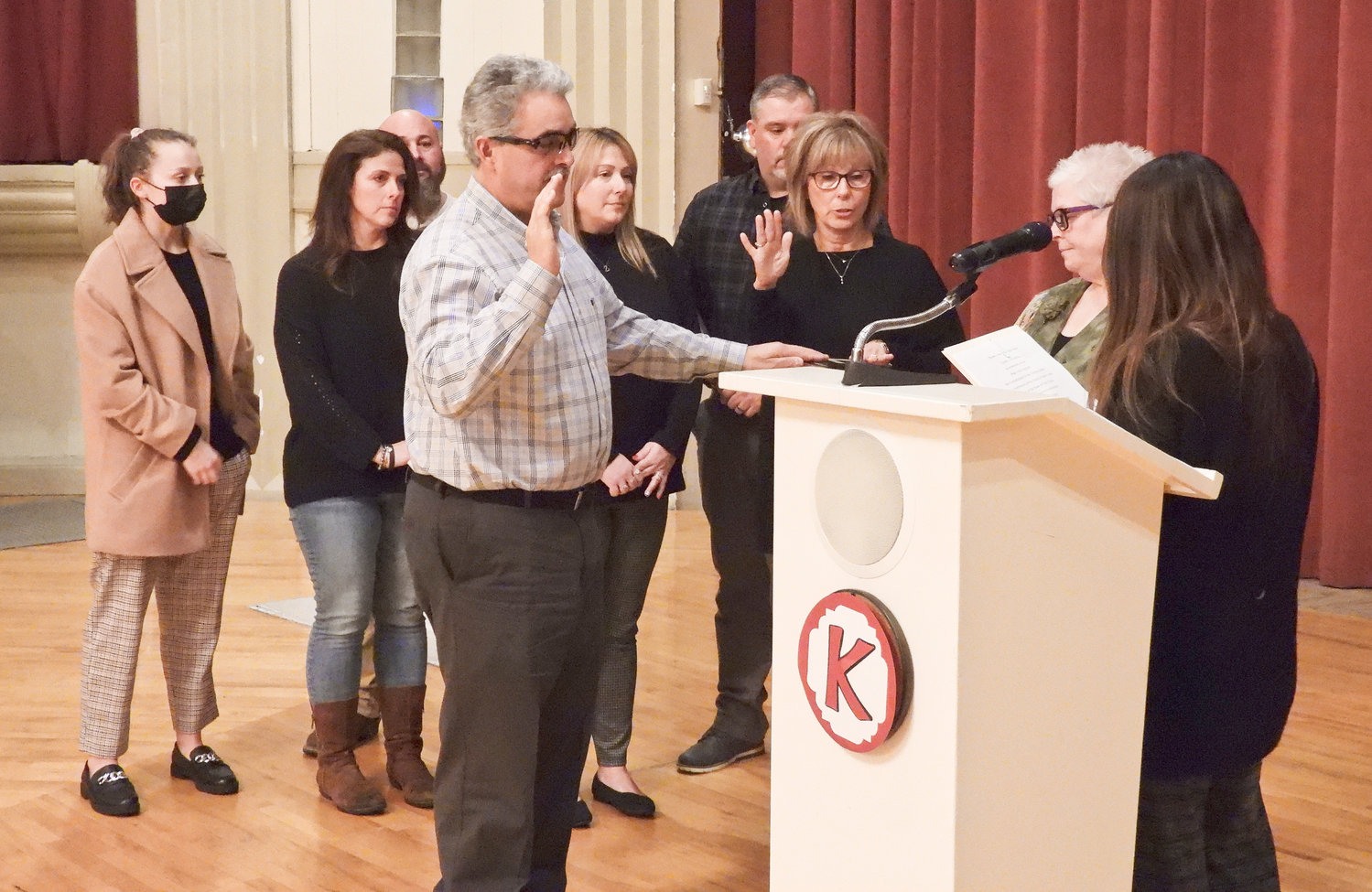 WARDS 4, 5, 6 — Madison County Supervisor Joseph Magliocca, left, takes his oath of office alongside the family of Joseph Ostrander, who was sworn into office posthumously.