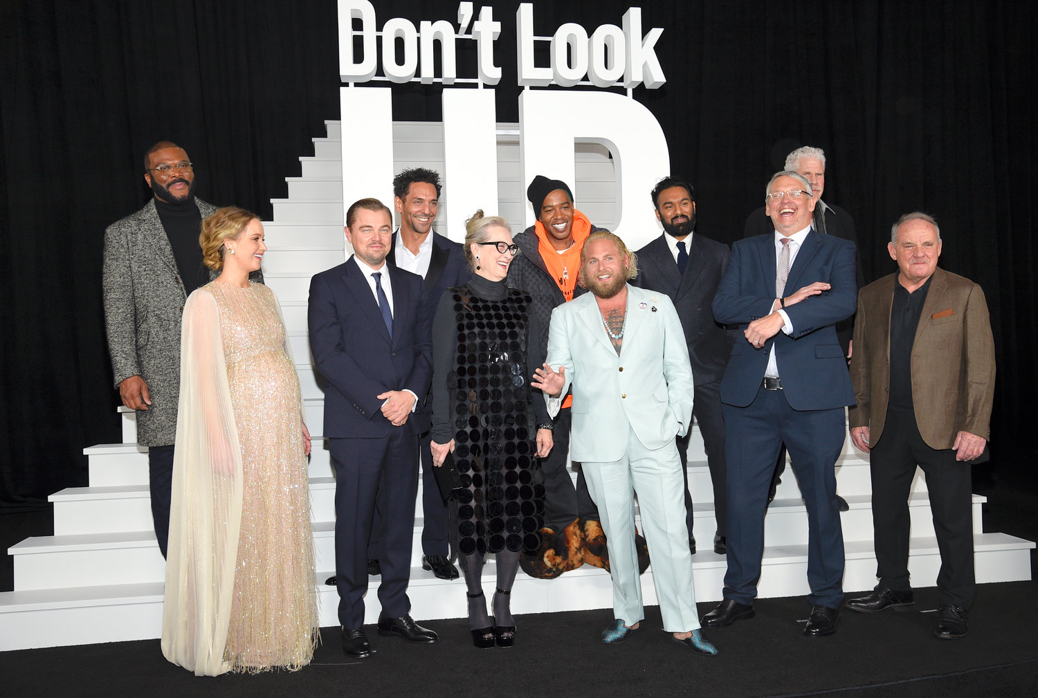 WORLD PREMIERE — Tyler Perry, left, Jennifer Lawrence, Leonardo DiCaprio, Tomer Sisley, Meryl Streep, Kid Cudi, Jonah Hill, Himesh Patel, Adam McKay, Ron Perlman and Paul Guilfoyle pose together at the world premiere of “Don’t Look Up” on Dec. 5, in New York.