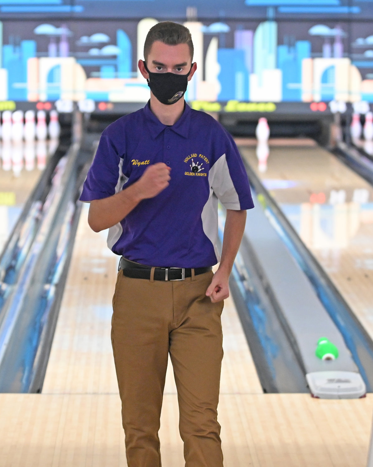 STRIKE — Wyatt Humpf reacts to his strike bowled in the first game, first frame Thursday at King Pin Lanes against Herkimer. The senior at Holland Patent is a co-captain in his fifth year with the team.