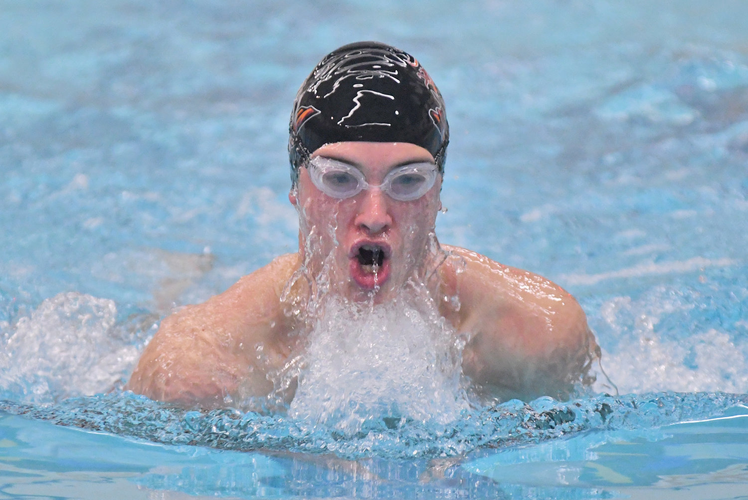 UP FOR AIR — Rome Free Academy swimmer Jack Anderegg comes up for a breath of air while competing in the breaststroke portion of the 200-yard medley relay during this Dec. 16 file photo in Holland Patent. Anderegg won the 100 butterfly in 1:09.31 against Cooperstown on Thursday.