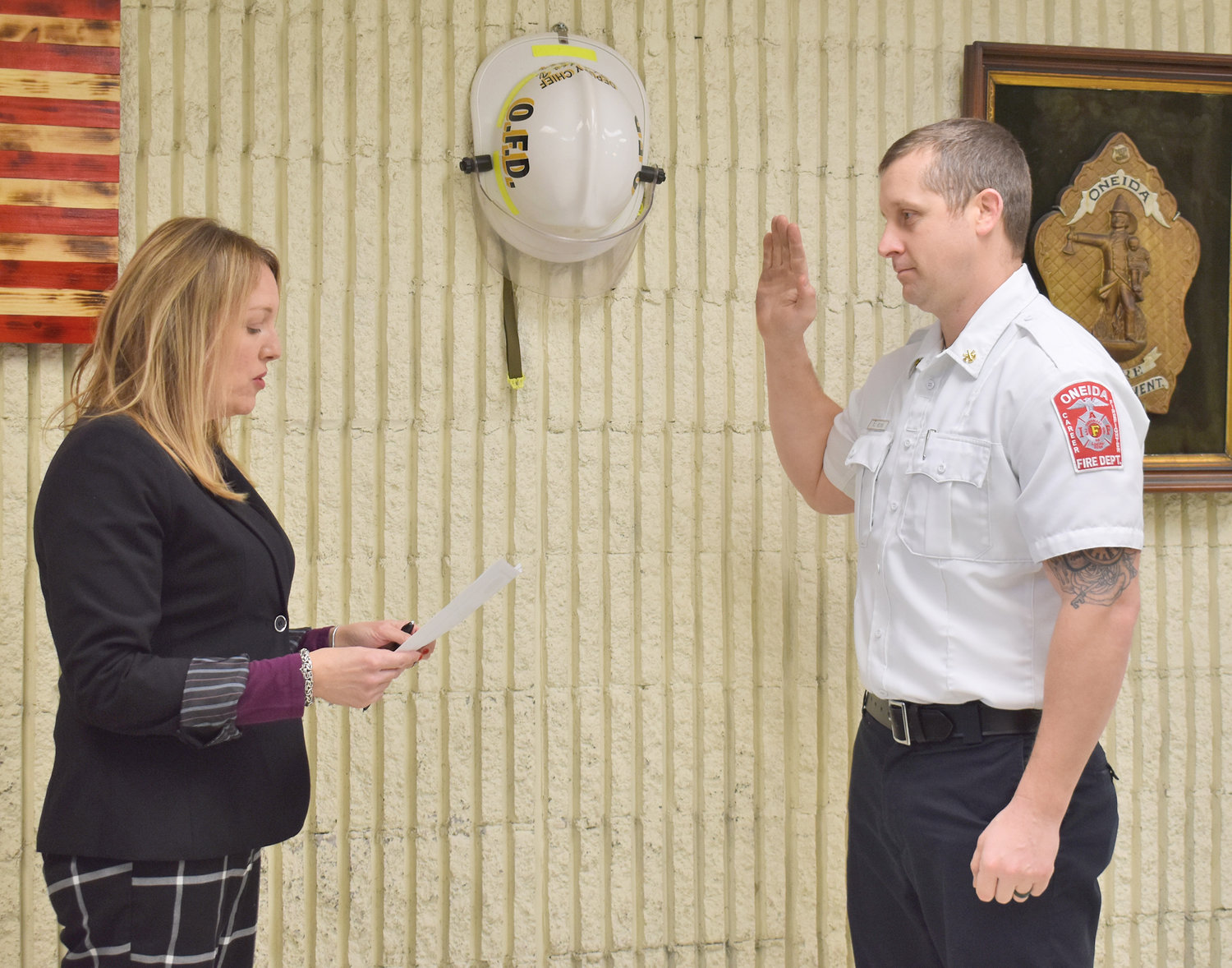 SWORN IN — On Monday, Jan. 17, 2022, City of Oneida Deputy City Clerk Andrea Hitchings, left, swore in Dennis Relyea as a deputy chief of the Oneida Fire Department. Relyea has been with the department for 12 years; he previously held the position of lieutenant.