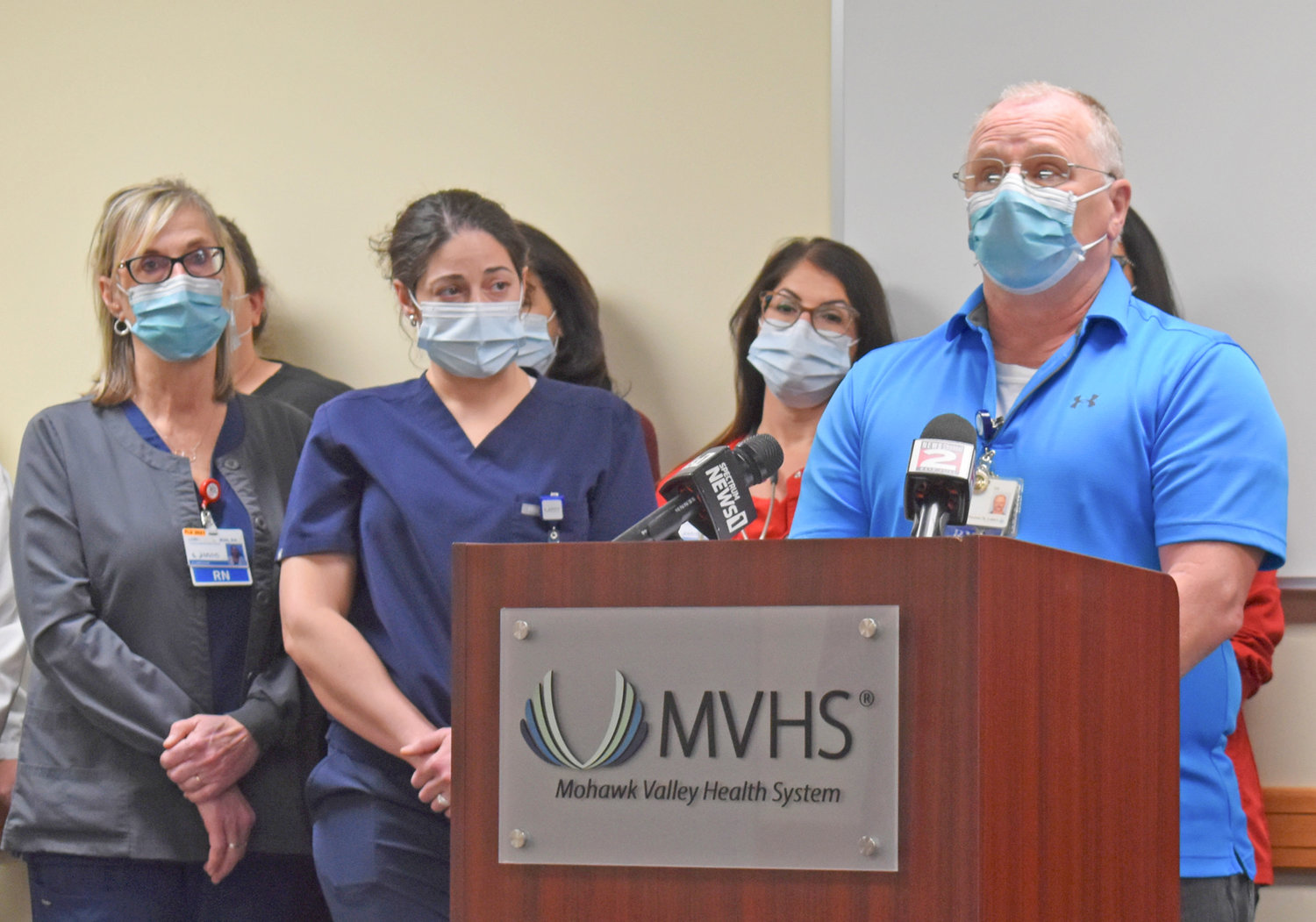 DETAILS — Les Congdon, a relief charge nurse in the emergency department at the Mohawk Valley Health System, is surrounded by MVHS nursing staff at a Wednesday news conference where he told reporters of a recent assault incident in the ER.