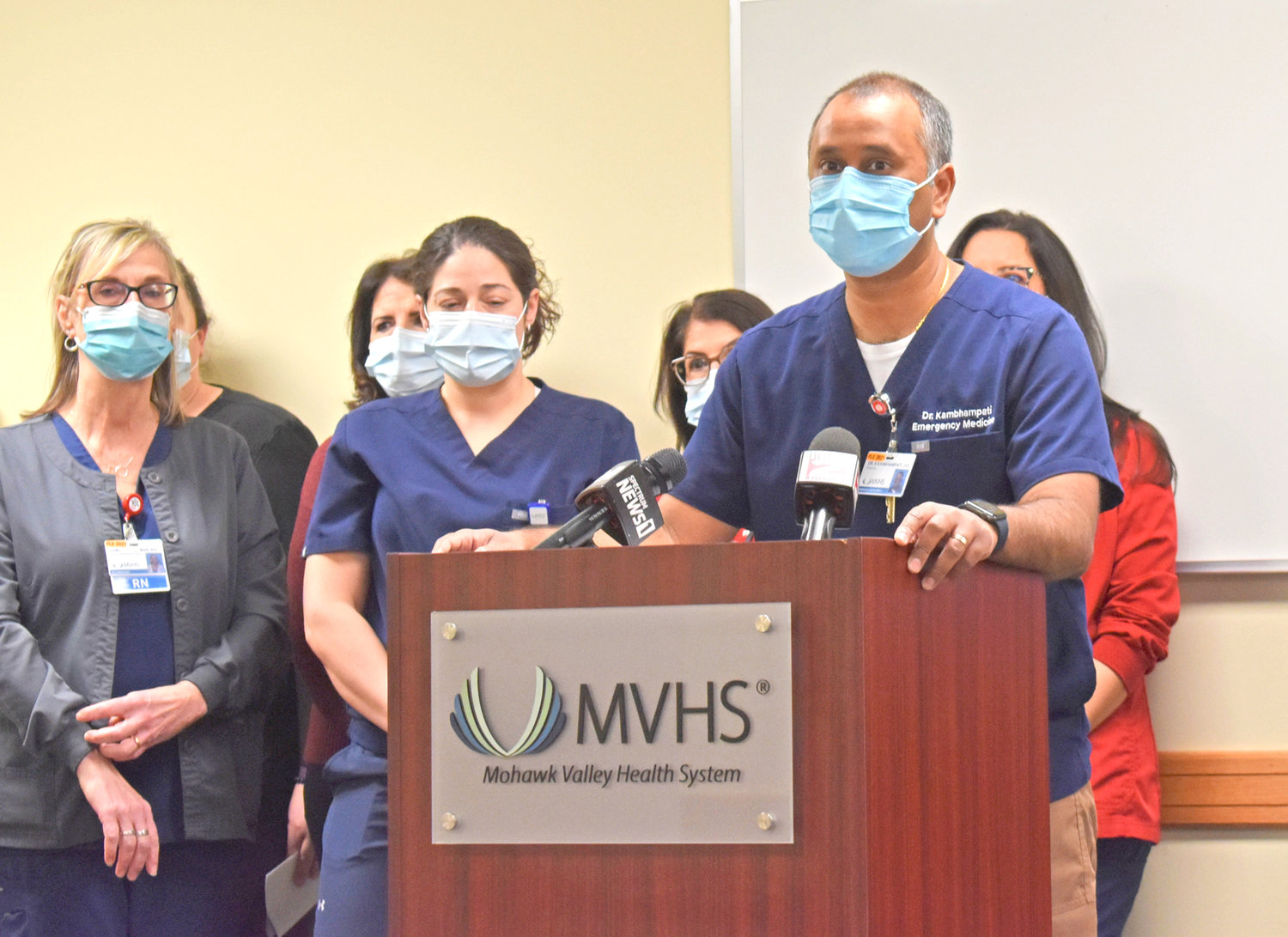 PATIENCE — Avinash Kambhampati, the vice chairperson of emergency medicine at the Mohawk Valley Health System, is flanked by MVHS nursing staff at a Wednesday news conference where the healthcare workers detailed escalating acts of patient aggression in the past year.