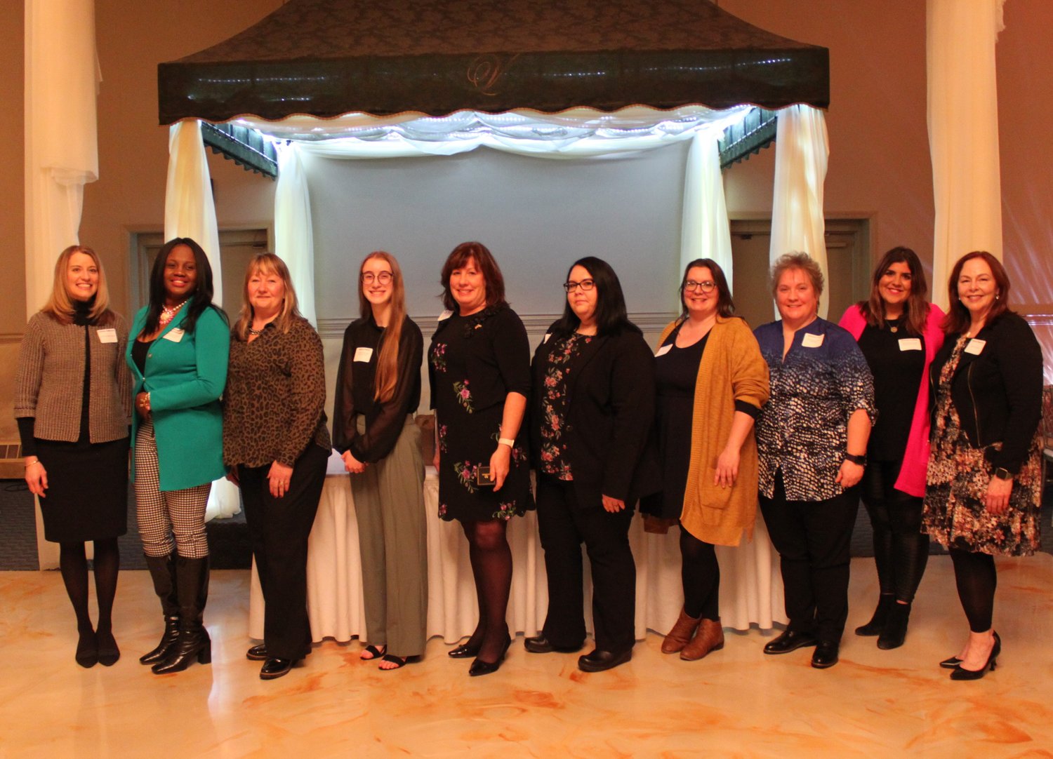 HONOREES UNVEILED — The YWCA Mohawk Valley announced its honorees for its annual Salute to Outstanding Women on Thursday. From left: YWCA MV Board President Jen DeWeerth; Oneka Roach-Campbell; Dawn Roller; Sophia O’Neill;  Assemblywoman Marianne Buttenschon; Amy Jennings; Juli Webster; Natasha Homa; Danielle Padula; and YWCA MV CEO Dianne Stancato.