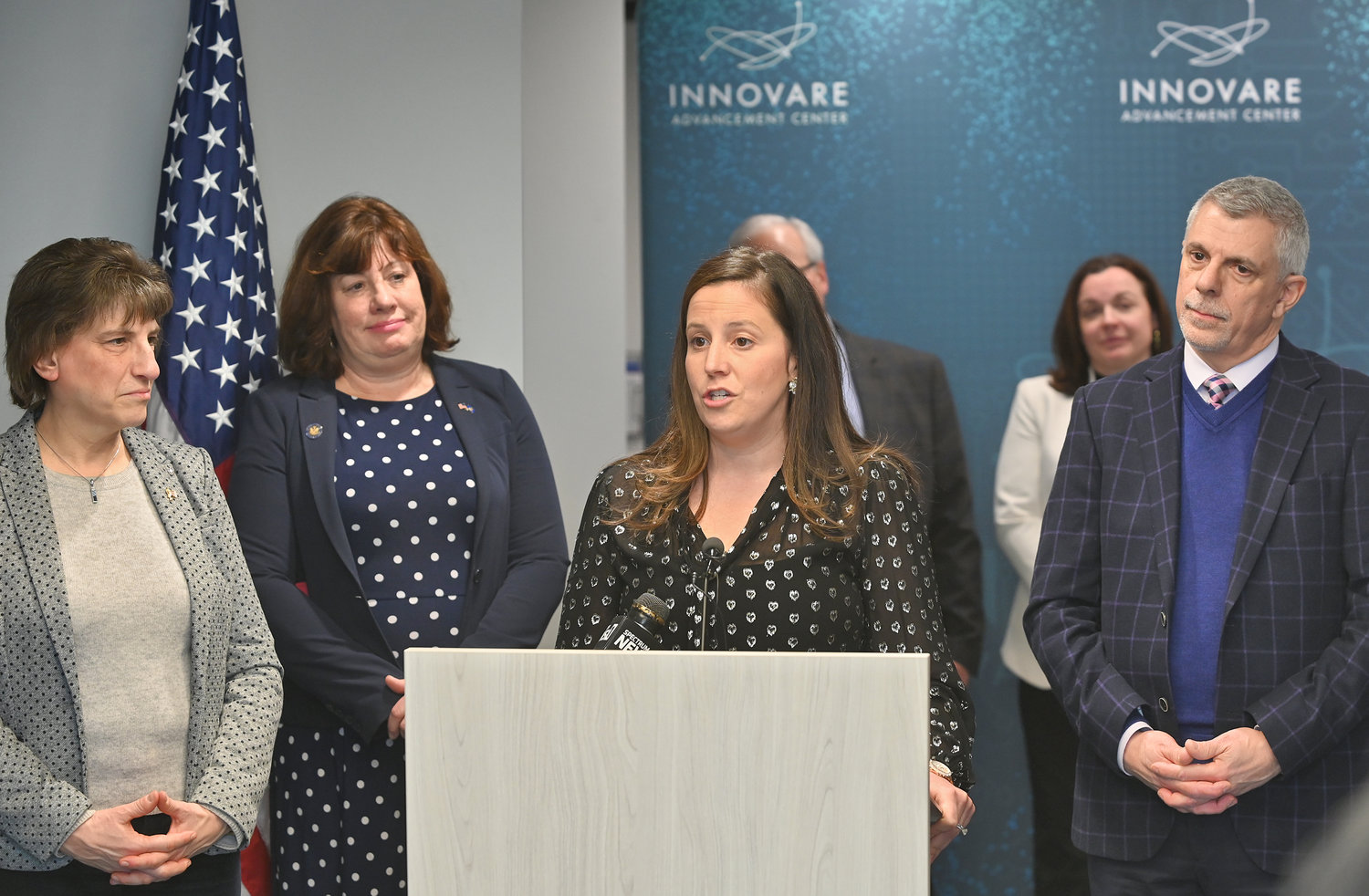 NEW DISTRICT — Congresswoman Elise Stefanick speaks to reporters with Rome Mayor Izzo, Assemblywoman Marianne Buttenschon, and Oneida County Executive Anthony Picente in attendance during her tour of Rome Laboratories on Tuesday.