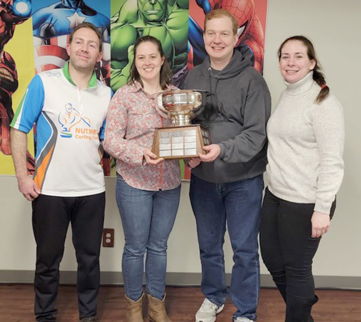 PRESIDENT’S CUP WINNER — A team from the Nutmeg Curling Club of Connecticut defeated Utica 1 by a score of 7-4 on Sunday, Feb. 20 at the Utica Curling Club’s Cobb Mixed International Bonspiel to win the President’s Bowl in the A Event. From left: Jonathan Carelli, Rebecca Andrew, Ed Scimia, and Allison Kenney.