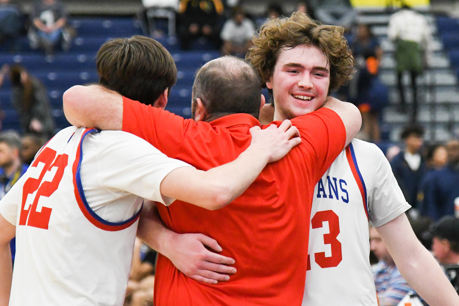 CELEBRATION -- New Hartford players Zach Philipkoski and Colton Suriano hug their coach John Randall after winning the Section III Class A final against Syracuse Academy of Science on Sunday at SRC Arena. Philipkoski was named the Section III Class A Most Valuable Player.