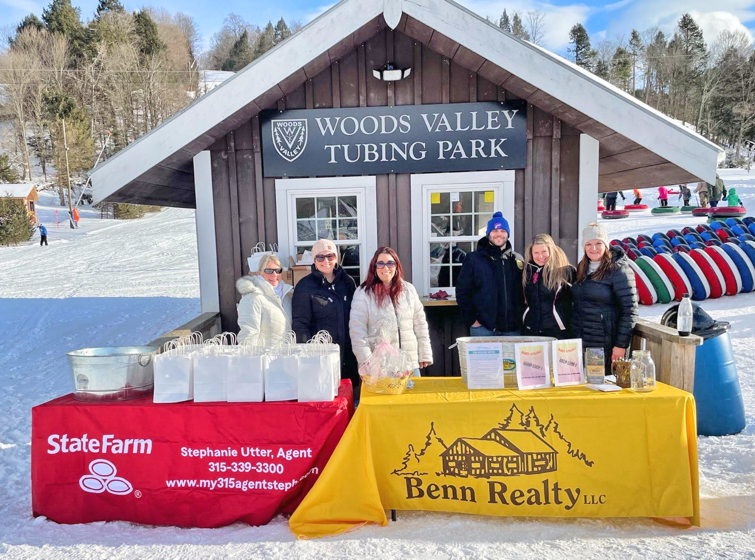 COMMUNITY SUPPORT — The Rome office of Benn Realty and Stephanie Utter, State Farm agent, recently co-sponsored a free tubing event at the Woods Valley Ski Center for those that picked up tickets at either office prior to the event. In addition to the free tubing, the sponsors also provided some refreshments for families as well as gift bags for event participants.