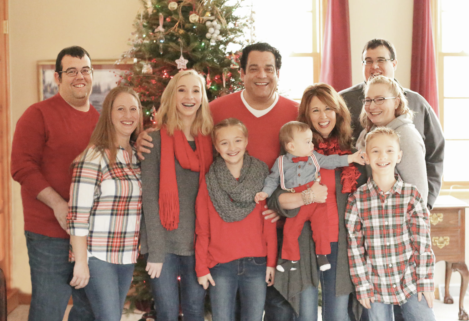 HAPPY FAMILY — Kevin Hall, center, pictured with his family during Christmas including his two sons, their wives, and his four grandchildren.
