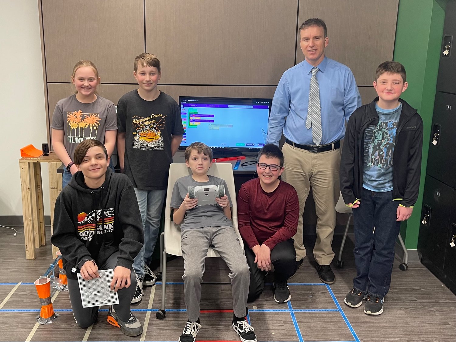 HEADED FOR WORLD CHAMPIONSHIPS — A team of Adirondack Central School sixth-graders have advanced to compete in the Sphero World Championships, a STEAM-based competition. From left: front row: Logan Peters; Ryan Girouard; and Drew Weber; back row: Makayla Ward; Charlie Hinsdill; Justin Wiedrick, district teacher and team coach; and Dominic Reppard.