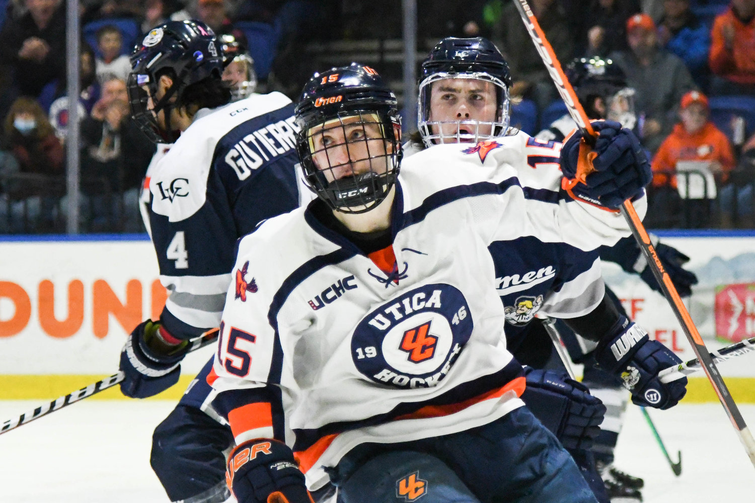 BIG SEASON — Eric Holland (15) and the Utica University men's hockey team finished with a 25-3-1 record during the 2021-22 season.