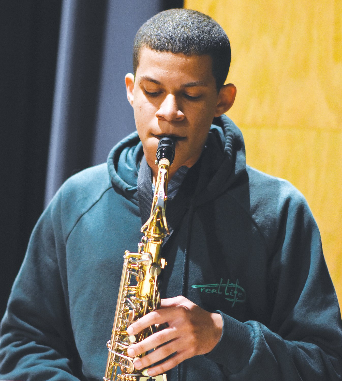 Ellis Pomales, RFA student, plays the saxophone (Teacher Jacob Meiss).