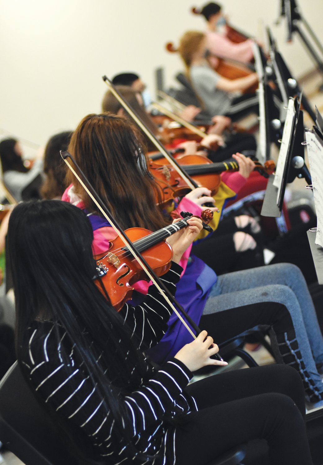 Students playing the violin in Linda Baker’s Class.