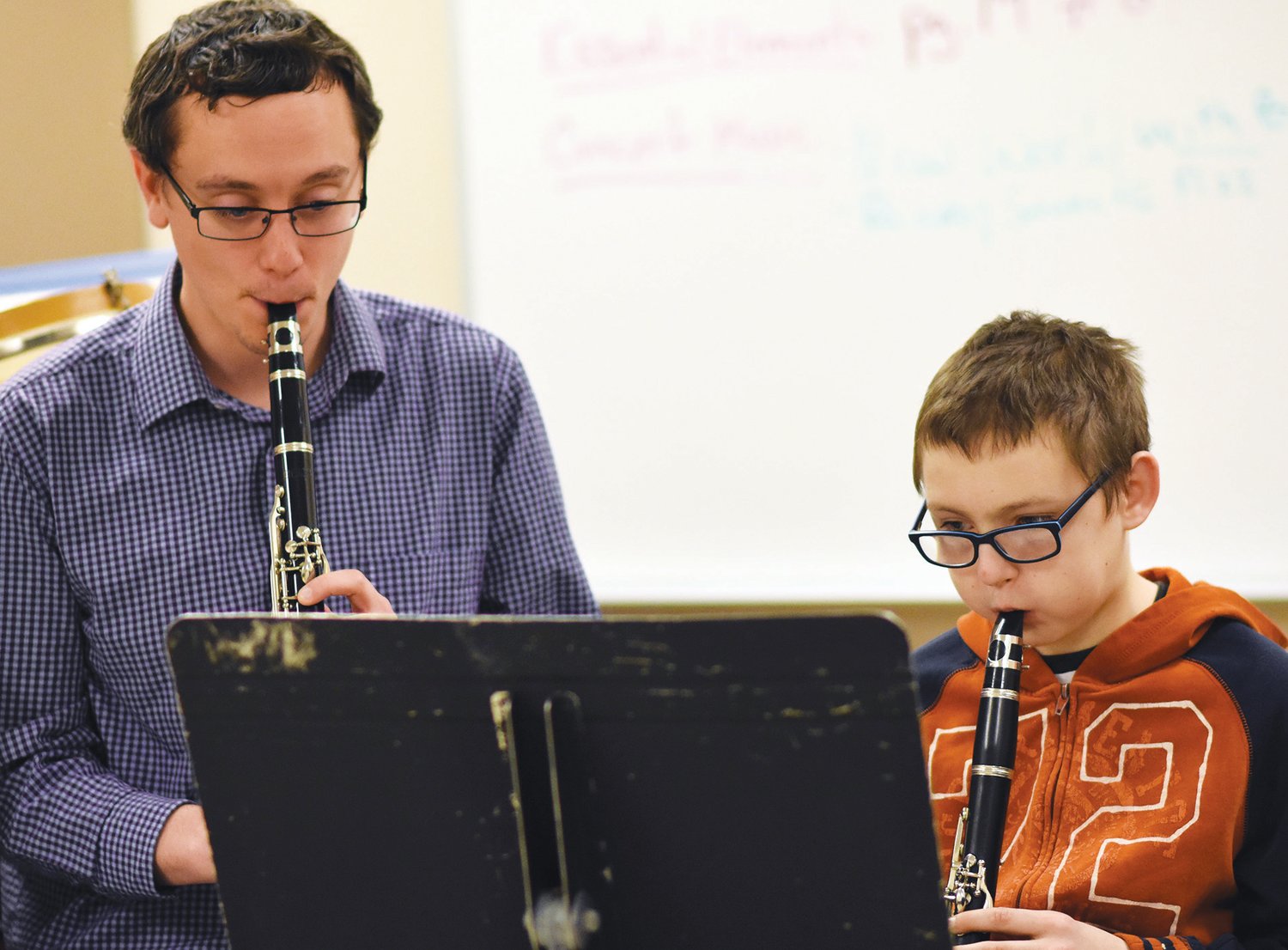 Bellamy Teacher, Stephen Russell practices the clarinet with student Daniel Kerber.