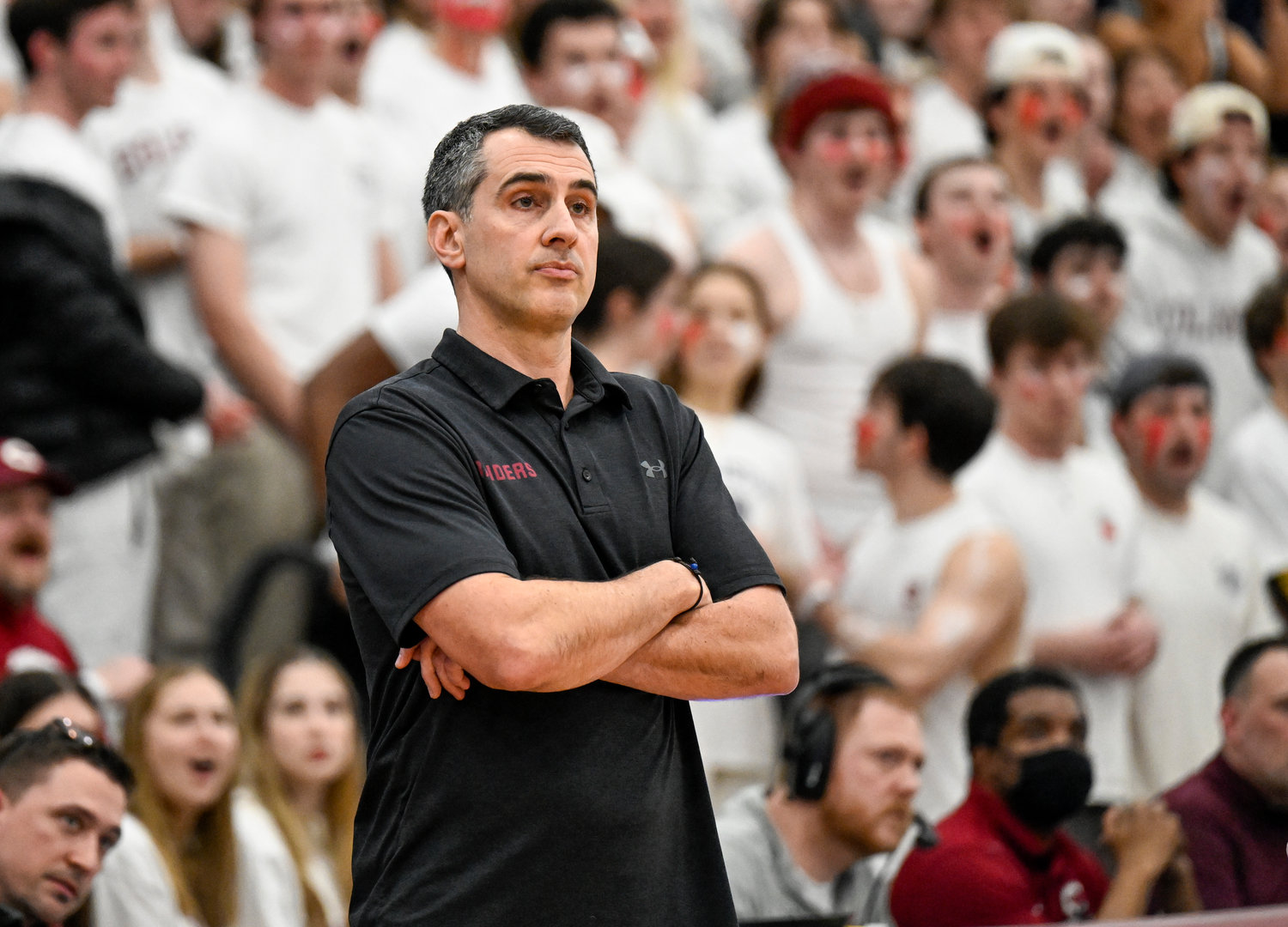 WATCHING CLOSELY — Colgate coach Matt Langel watches during the first half of the team's  game against Navy for the Patriot League men's tournament championship on March 9 in Hamilton. Colgate won 74-58.