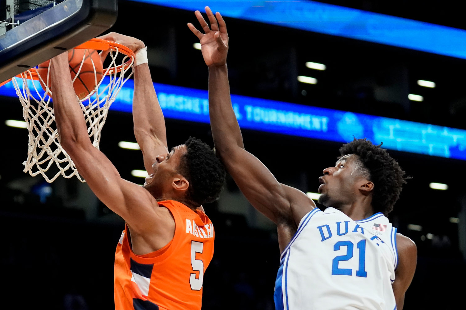 LOOKING TO TRANSFER — Syracuse's Frank Anselem (5) dunks against Duke's AJ Griffin (21) in the first half of a quarterfinal game of the Atlantic Coast Conference men's tournament on March 10 in New York. Anselem is entering the transfer portal.