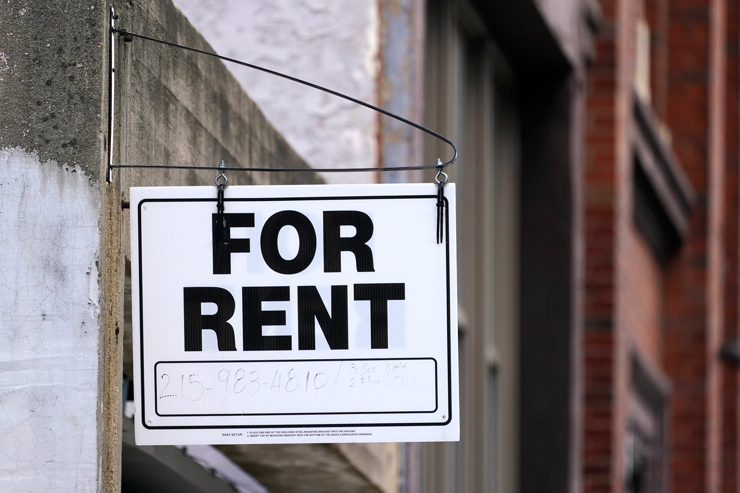 A "For Rent" sign is posted on a building, Tuesday, Jan. 18, 2022, in Philadelphia. The federal rental assistance is running out in some places, which is putting pressure on the U.S. Treasury Department to shift remaining funds to the states and cities most in need. Treasury has shifted more than $2 billion mostly to states and cities with a higher concentration of renters and away from small, mostly rural states.