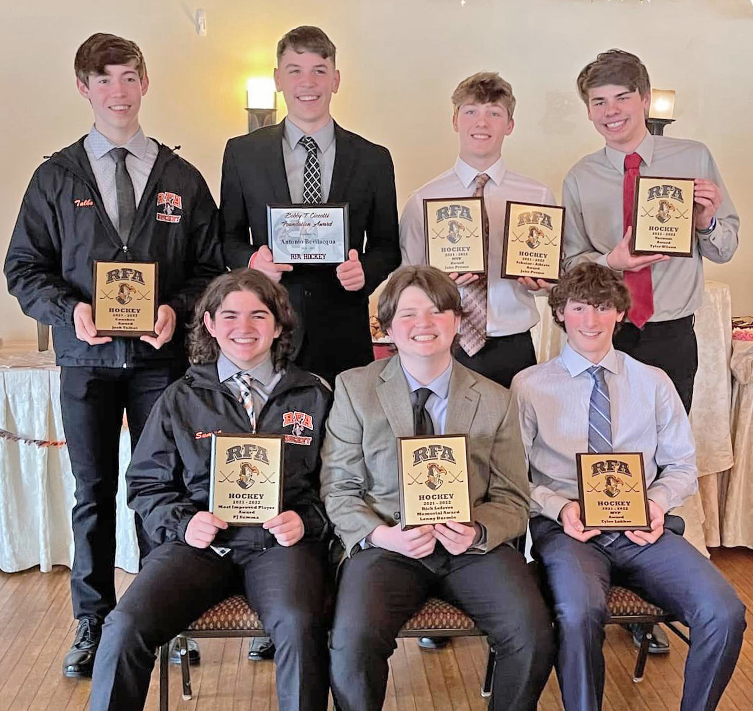 HOCKEY AWARDS — The Rome Free Academy varsity hockey team held its annual banquet on March 27 at the Delta Lake Inn. From left: Josh Talbot, Coaches Award; PJ Summa, Most Improved; Antonio Bevilacqua, Bobby T. Ciccotti Memorial Award; Lenny Dormio, Rick Lefevre Memorial Award; Jacob Premo, Scholar Athlete Award and Most Valuable Player; Tyler Lokker, Most Valuable Player; and Tyler Wilson, Vacuum Award. Premo, Lokker, Wilson and Bevilacqua were also named Section III Division I all-league team honorable mentions.